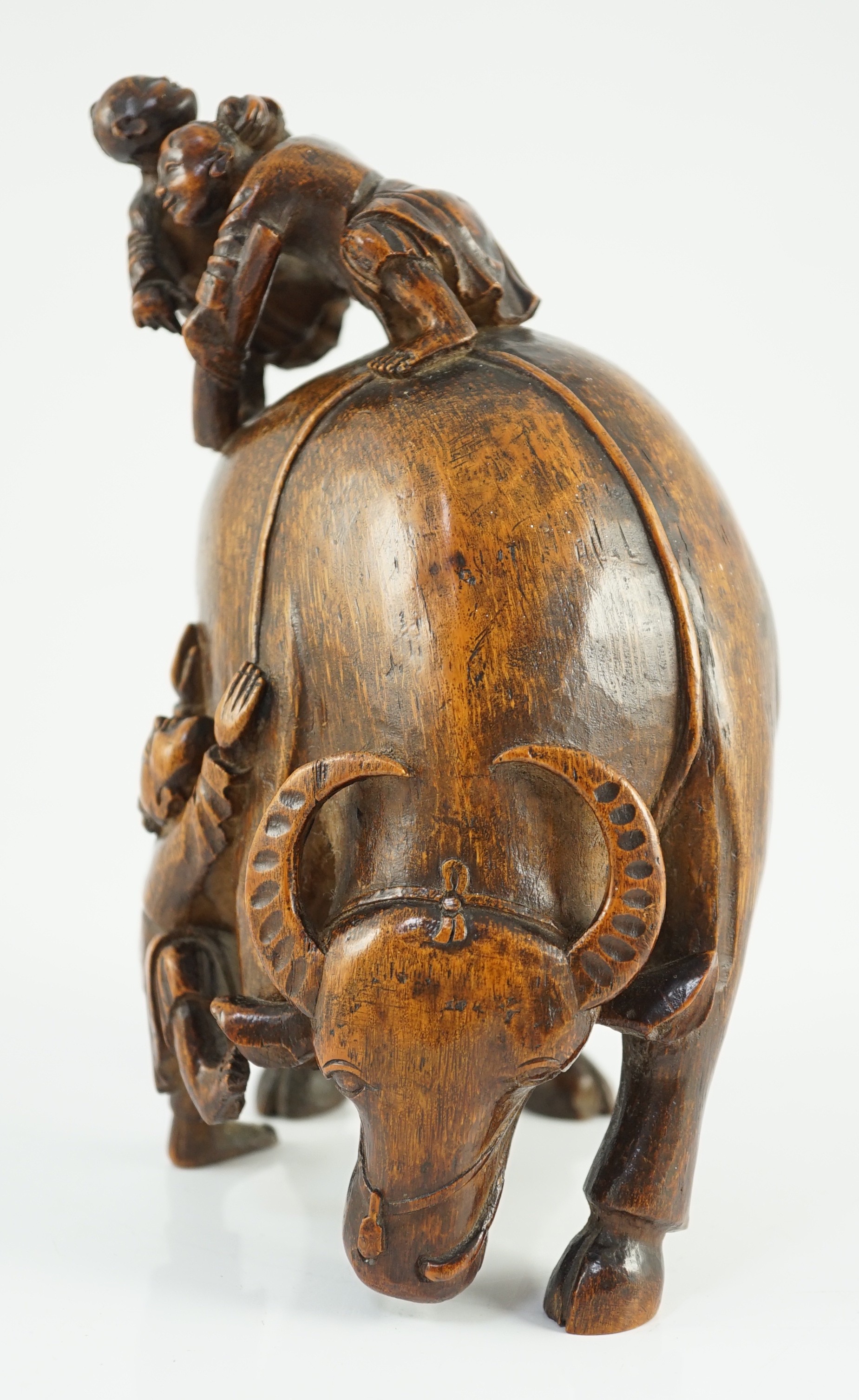 A Chinese bamboo ‘boys and buffalo’ group, 18th/19th century, 19.5cm high, one buffalo leg lacking